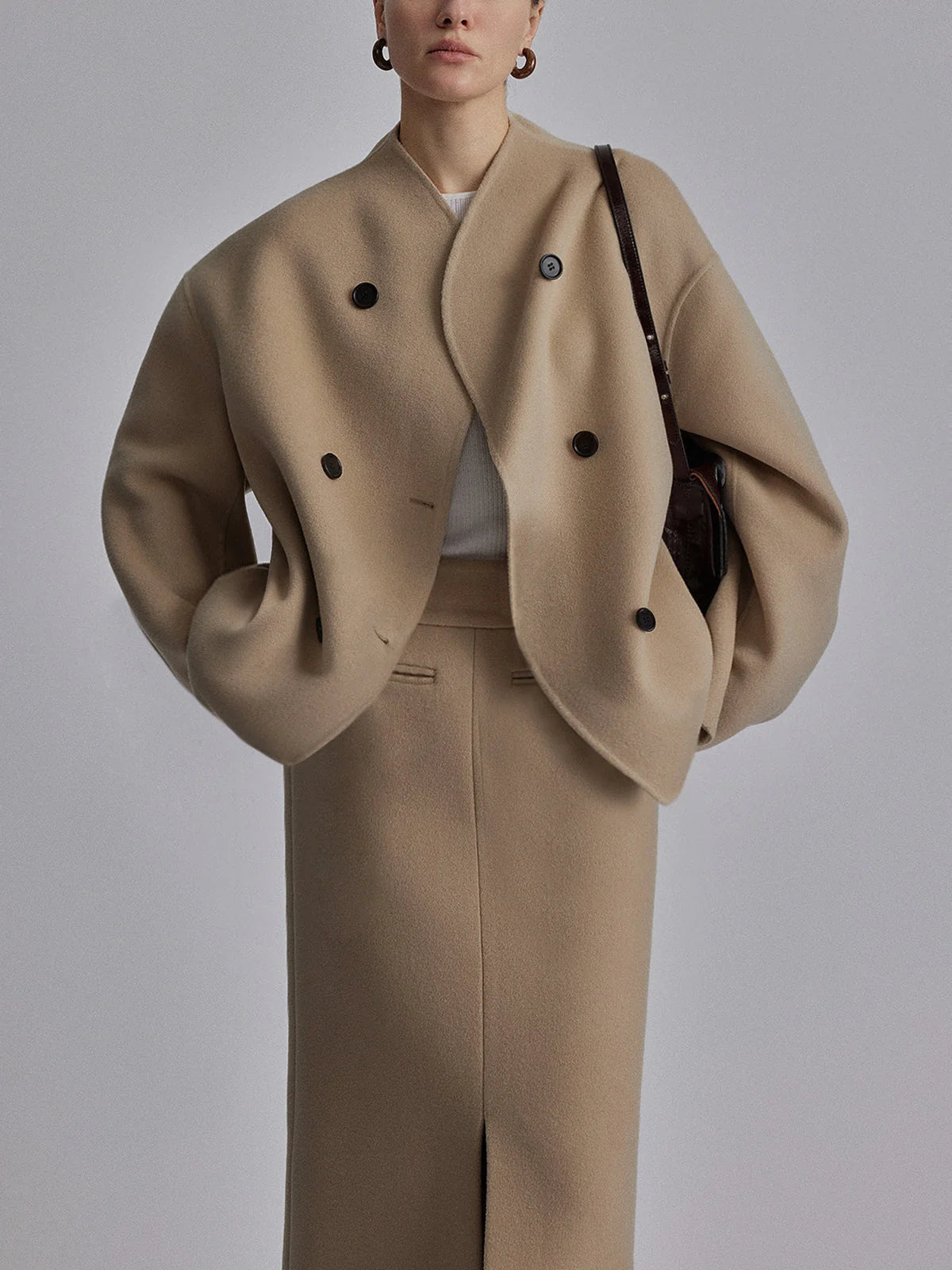 Full-length view of women's double breasted pea coat with relaxed proportions