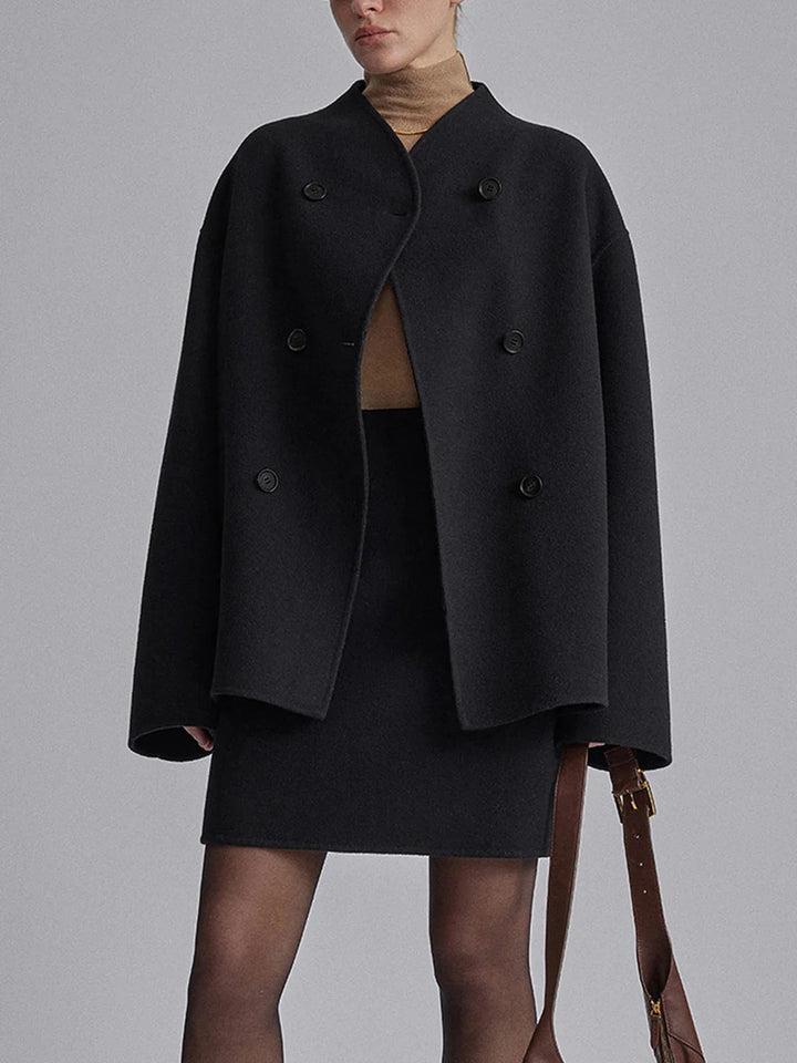 Women's pea coat in black showing versatile styling for formal occasions