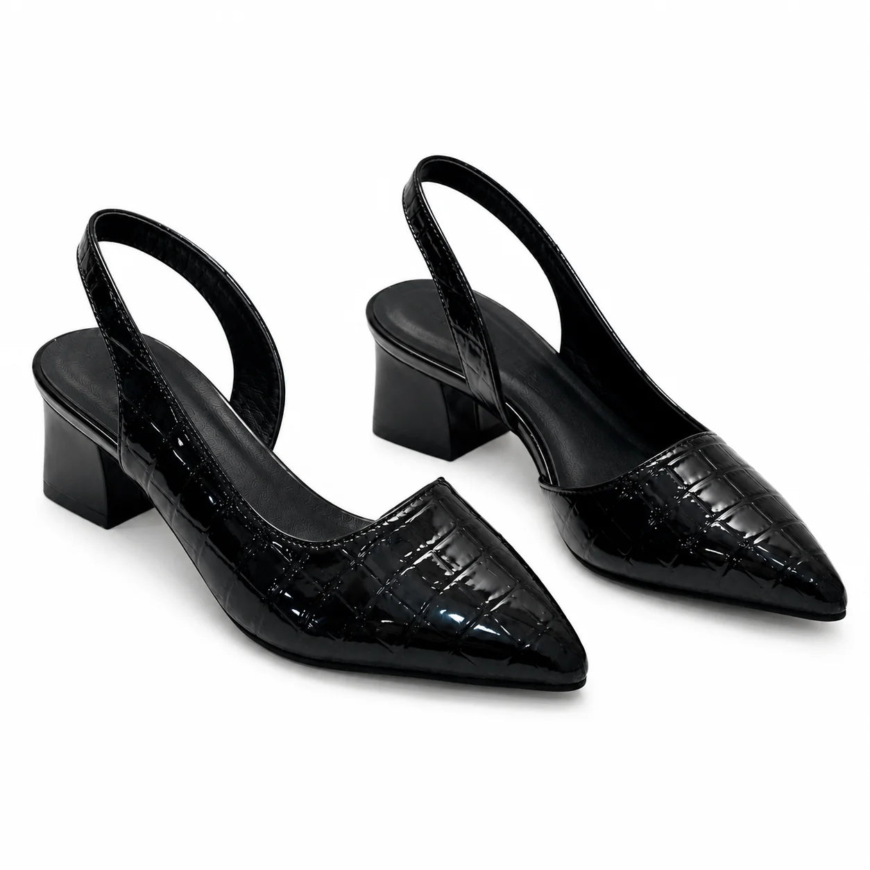 Top view of pointed-toe slingback heels showing crocodile pattern and structured upper design