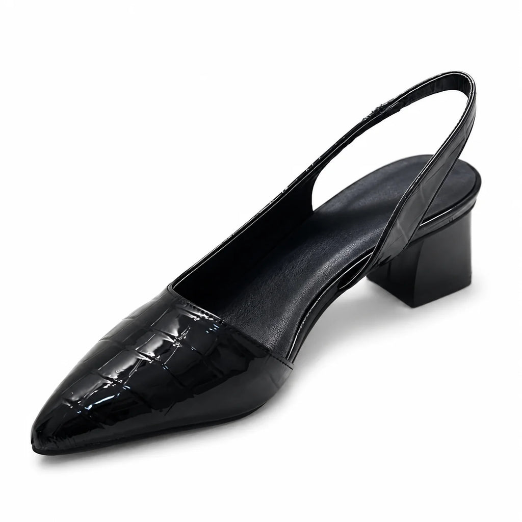 Women's brown slingback pumps from rear angle showing block heel and adjustable elastic strap