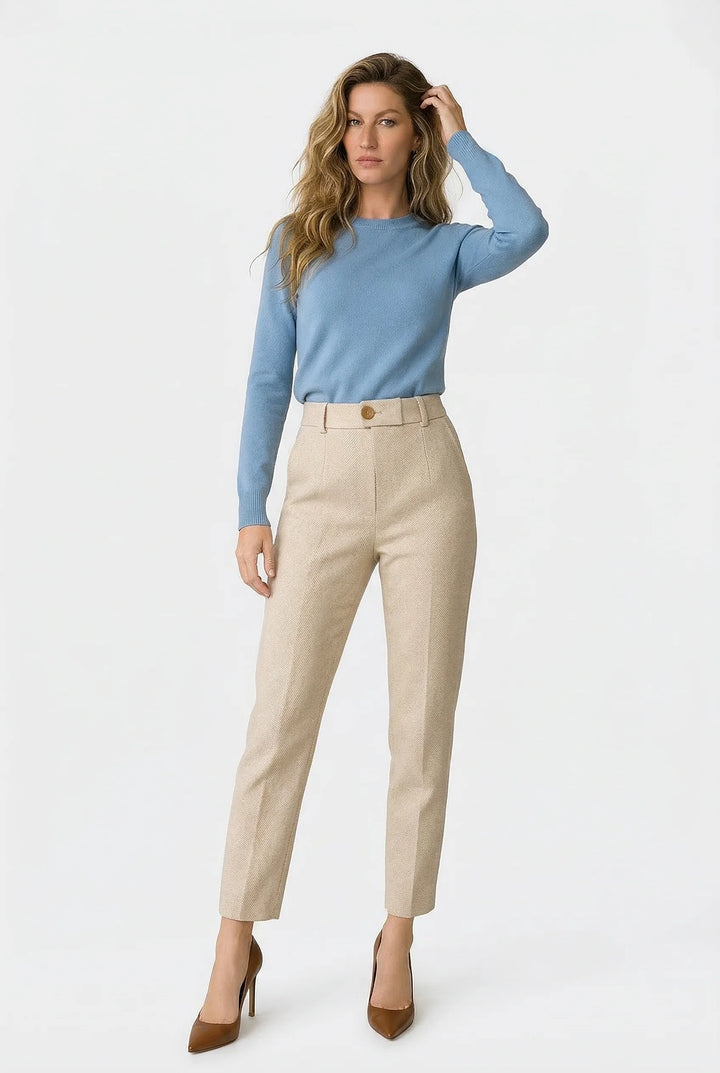 Close-up view of Women's Tailored Wool Pants showing structured wool-blend fabric and front button closure