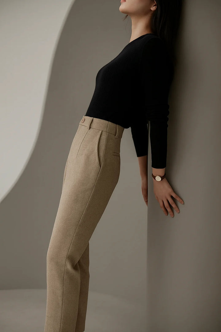 Full-length view of Women's Tailored Wool Pants paired with fitted turtleneck top