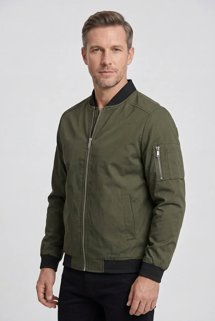 Men's bomber jacket front pockets and zip fastening close-up for practical everyday use