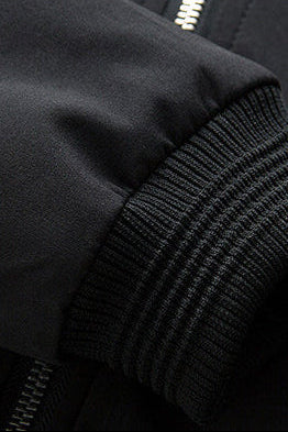 Close-up of bomber jacket zip fastening and smooth outer fabric construction for men