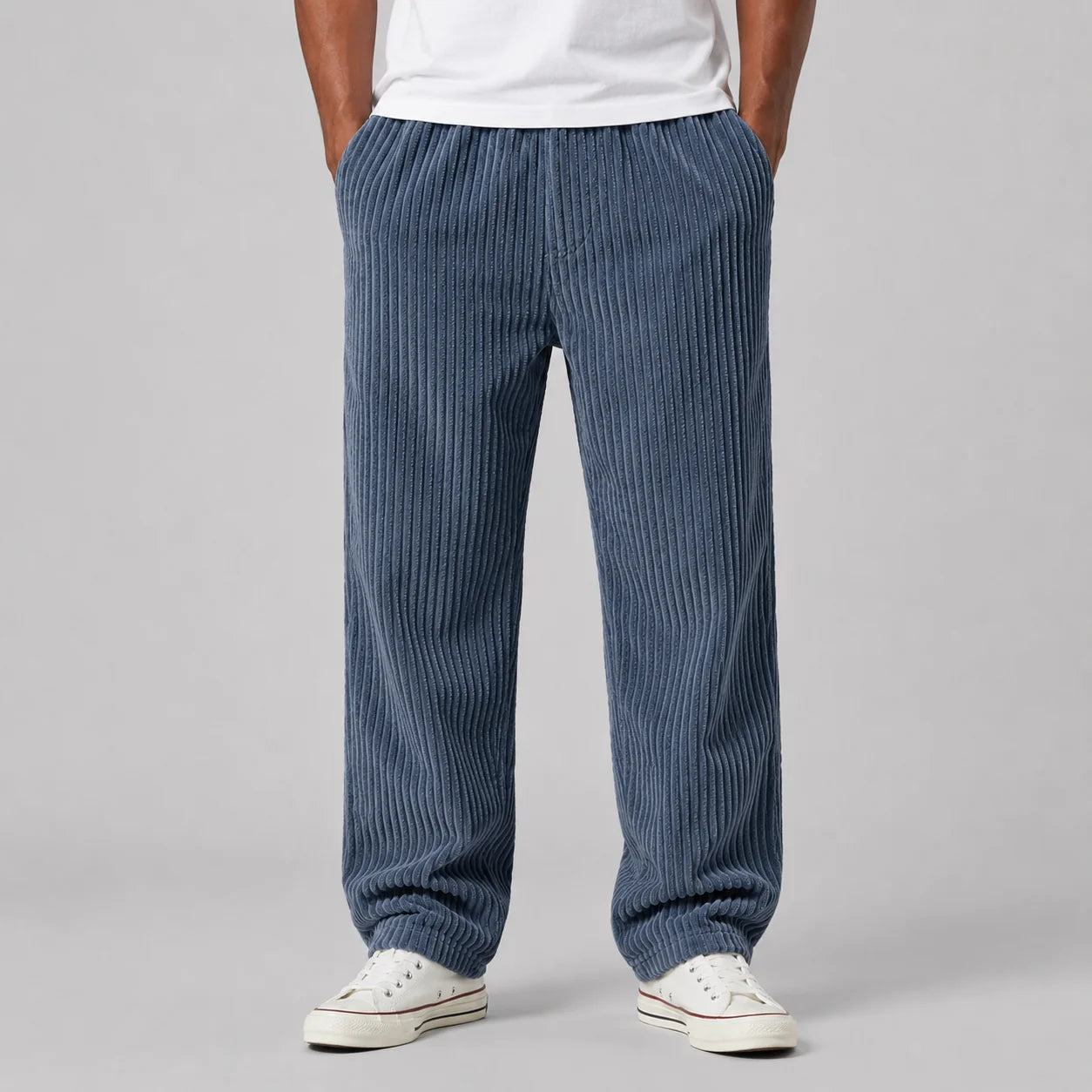 Men's ribbed corduroy trousers with drawstring waist detail and functional pockets