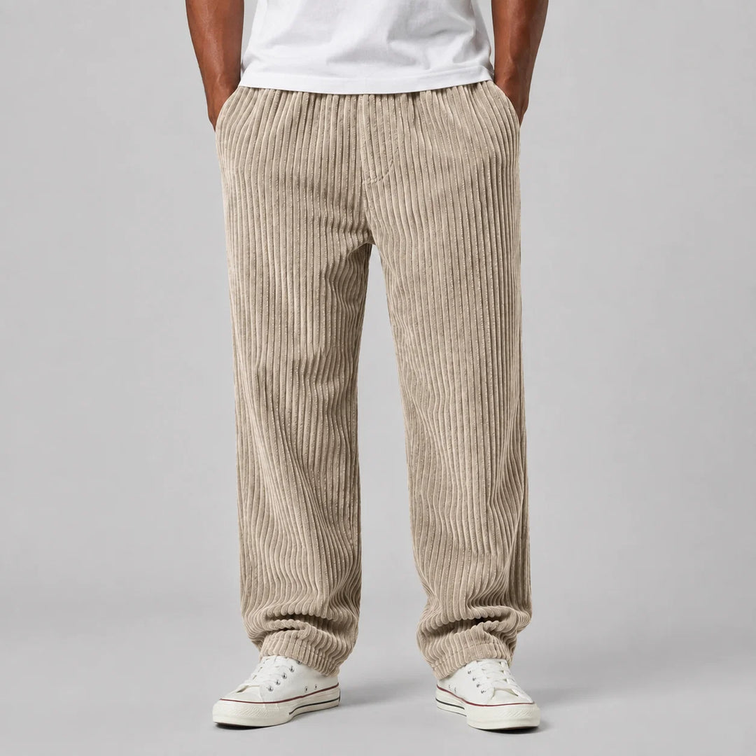 Grey corduroy trousers for men with natural drape and relaxed silhouette