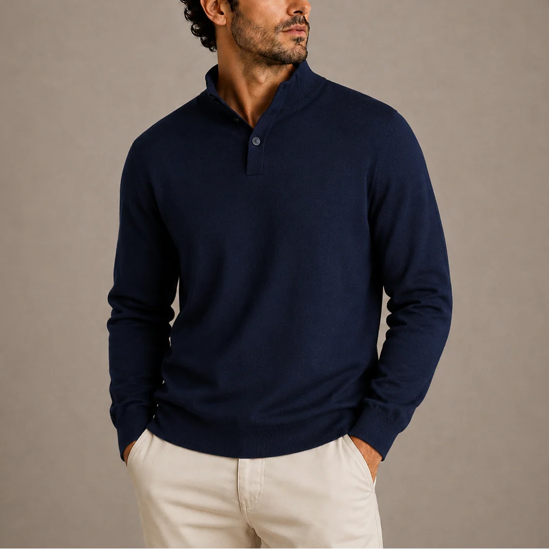 Side profile of men's knit polo jumper layered over white shirt for smart-casual styling.
