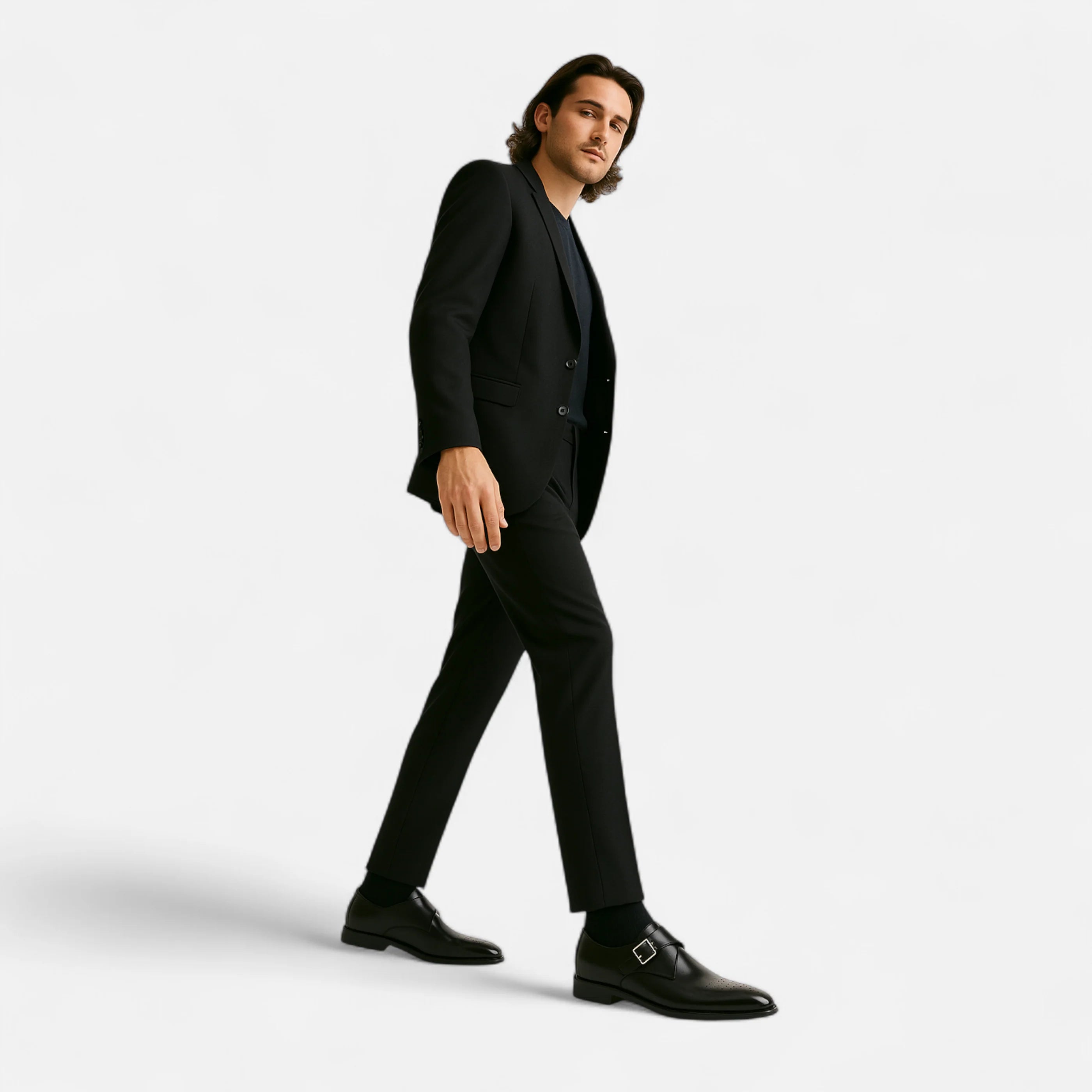 Overhead view of black monk strap shoes showing almond-shaped toe and structured upper