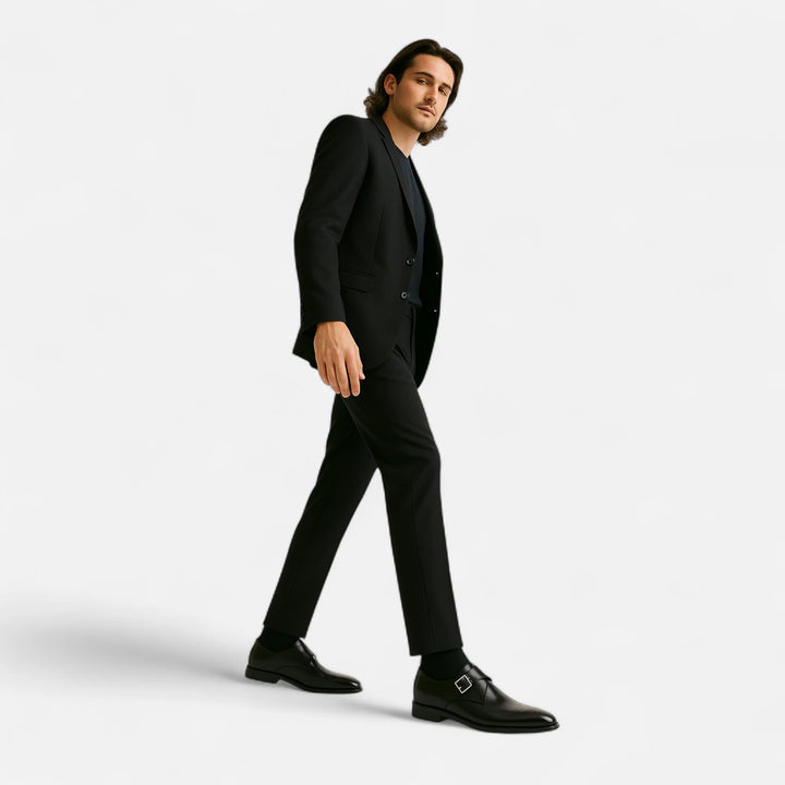 Overhead view of black monk strap shoes showing almond-shaped toe and structured upper