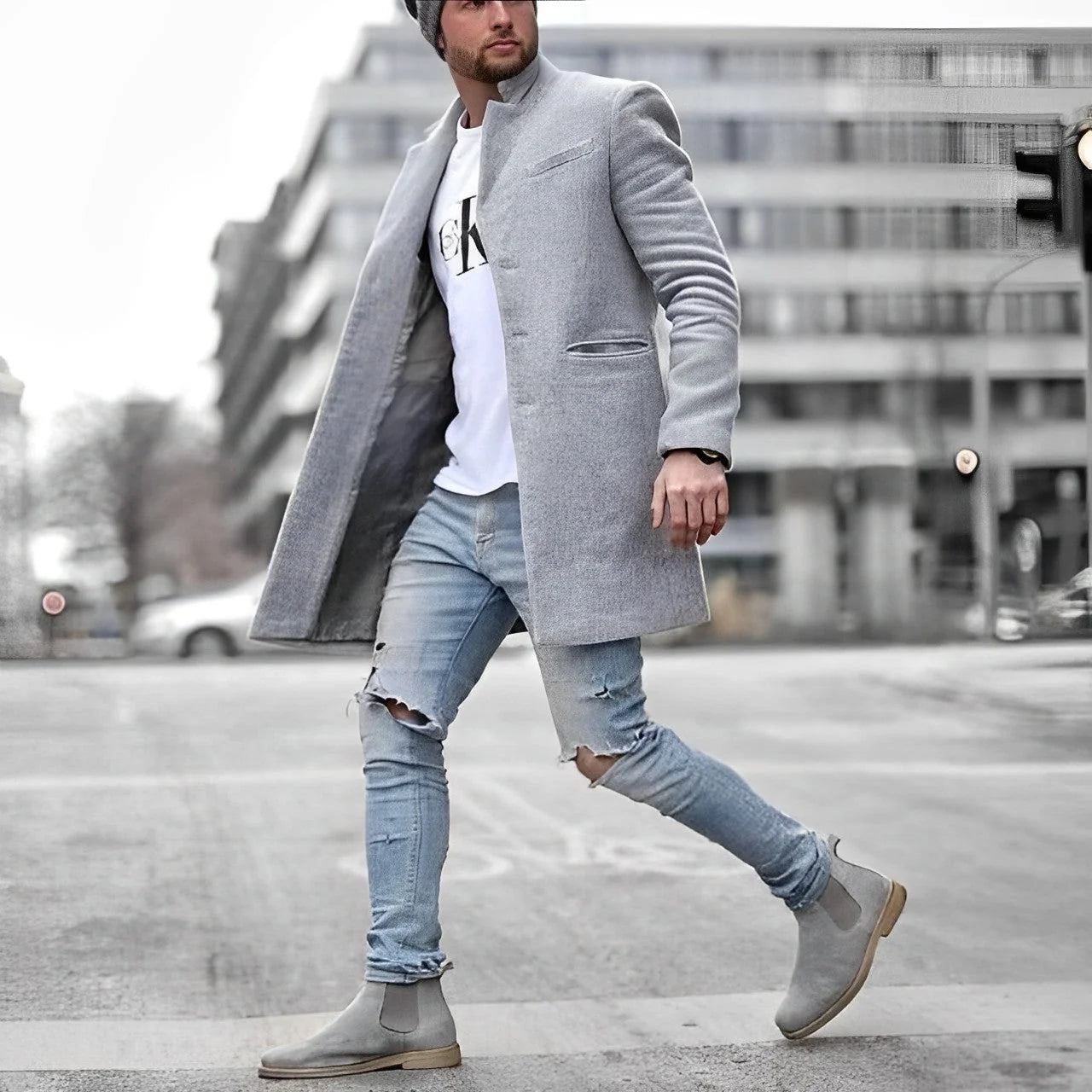 Men's slim-fit overcoat in grey with stand collar and mid-length cut worn over casual outfit