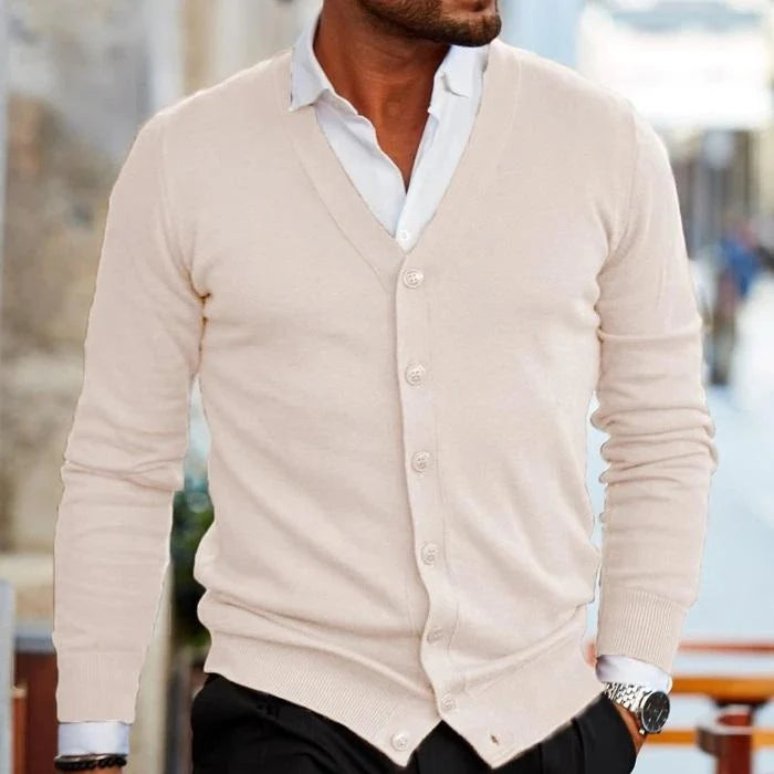 Full-length view of the burgundy cardigan paired with dark trousers for a smart-casual look