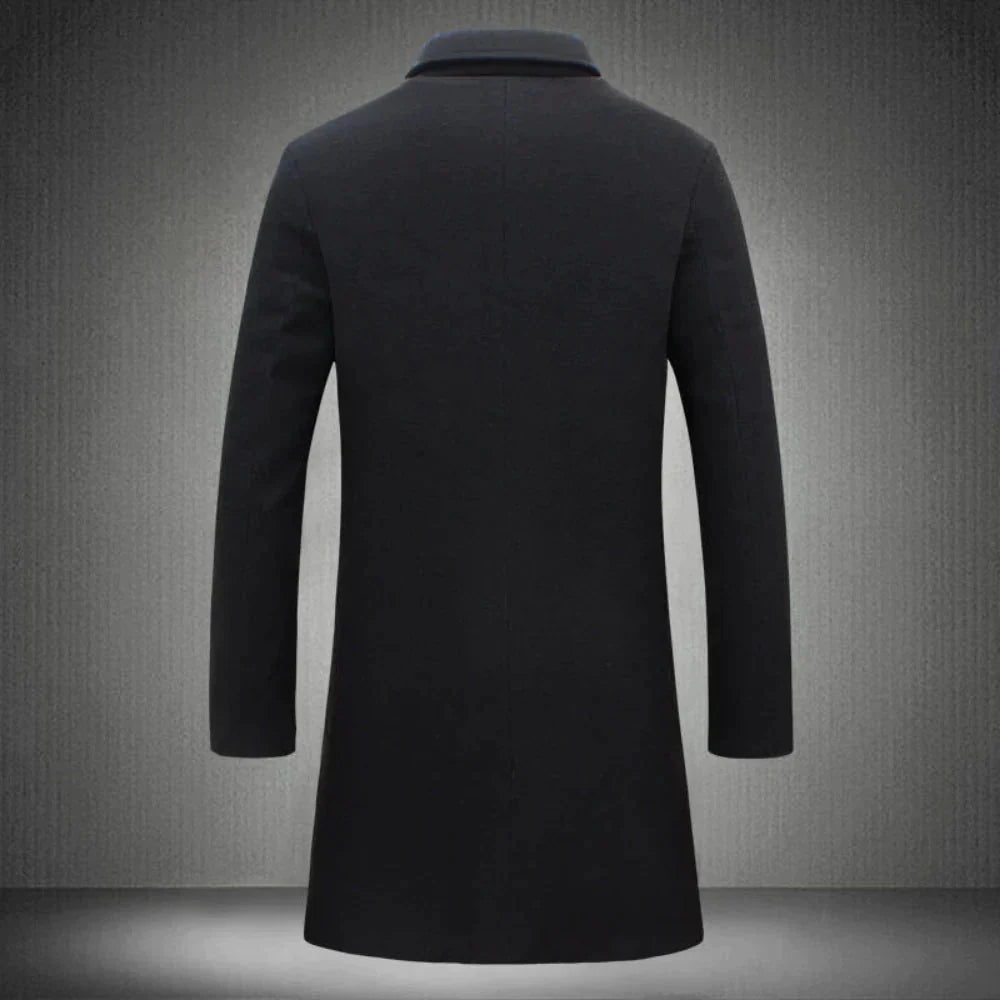 Side view of men's tailored wool overcoat showing mid-thigh length and structured silhouette