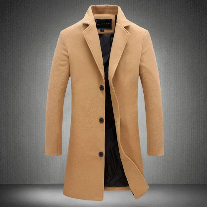Close-up detail of men's wool overcoat button closure and smooth fabric finish