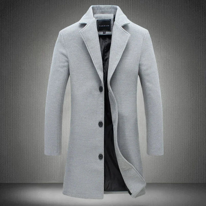 Back view of men's wool overcoat displaying tailored fit and centre vent detail