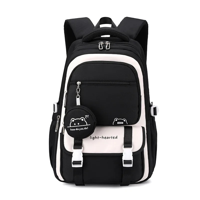 Detail of school backpack top handle and padded back panel for ergonomic comfort during daily use