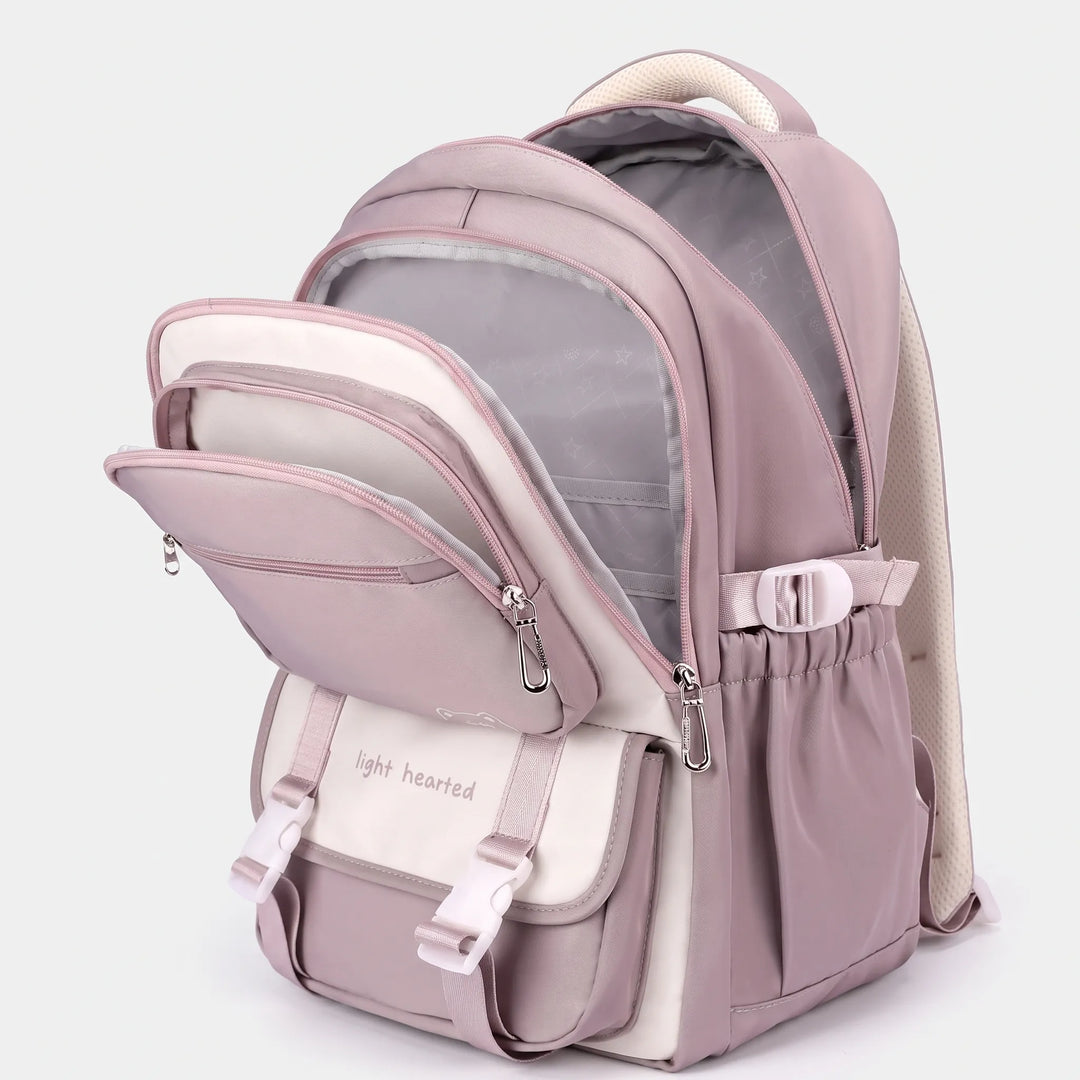 Side profile of school backpack showing padded shoulder straps and structured silhouette with multiple compartments
