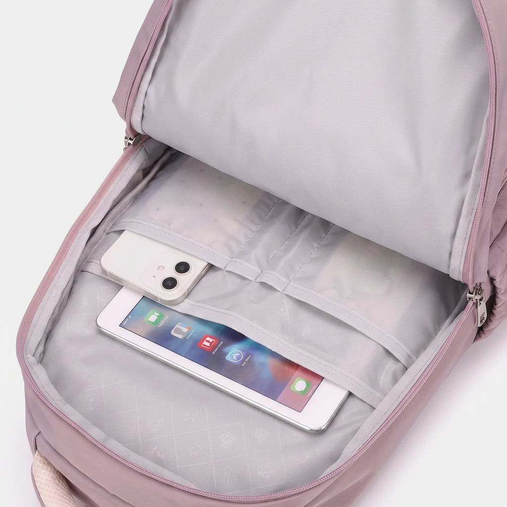 Overhead view of school backpack displaying main zip compartment and front organisational pockets