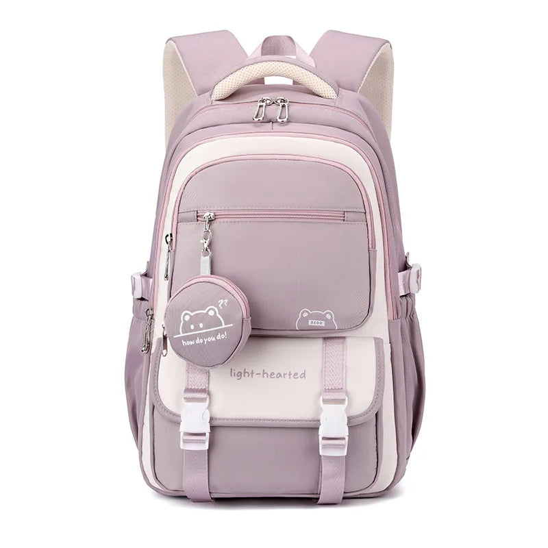 School backpack laid flat showing spacious main compartment and laptop sleeve interior organisation