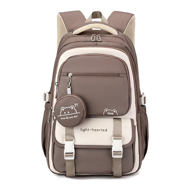 School backpack side angle showing depth of main compartment and adjustable strap hardware