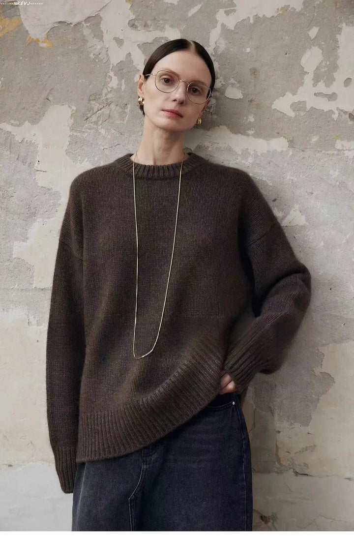Women's cashmere sweater showing relaxed drape and oversized proportions