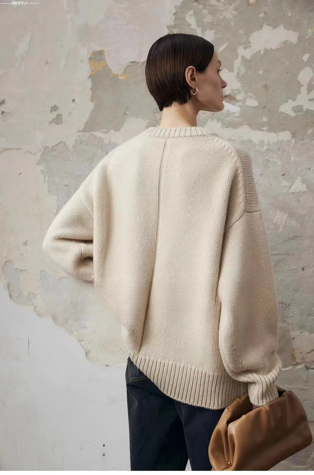 Front view of women's grey cashmere sweater with crew neck and drop shoulders