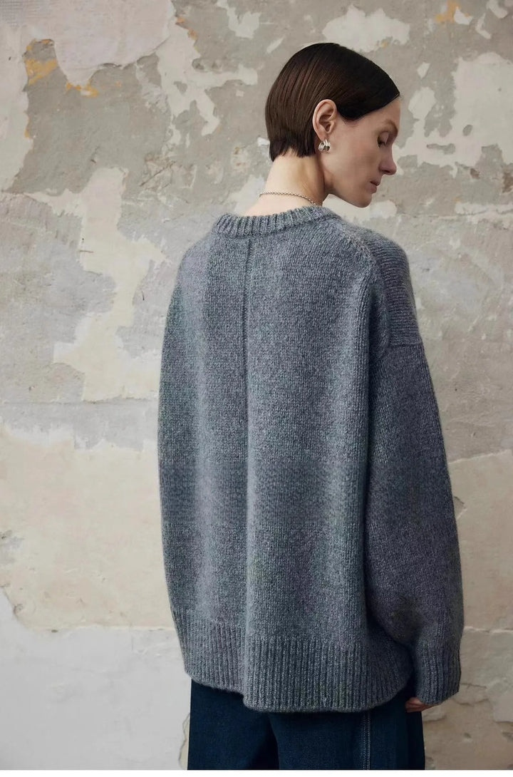 Side angle of cashmere sweater highlighting relaxed silhouette and knit construction