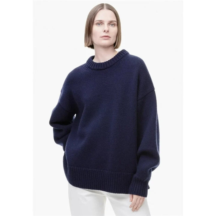 Oversized cashmere knit with ribbed crew neck and relaxed sleeves for layering