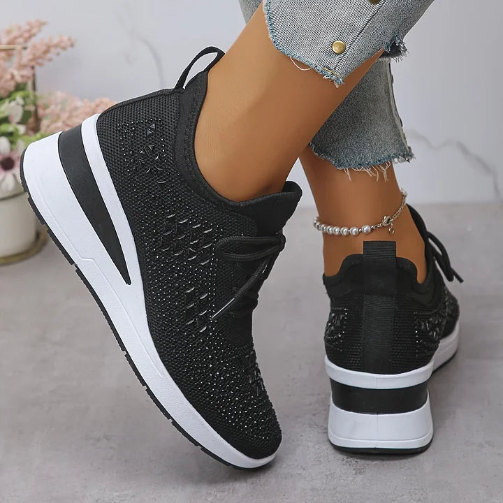 Women's trainers with rhinestone accents and grey stripe detail at heel counter