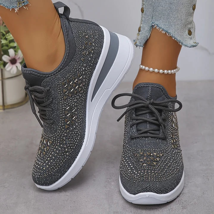 Women's embellished trainers with pull tab and supportive cushioned sole construction