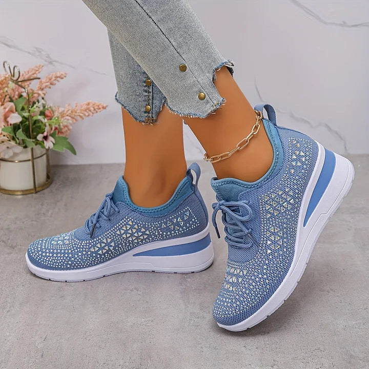 Pair of women's trainers with rhinestone and geometric detailing for everyday styling