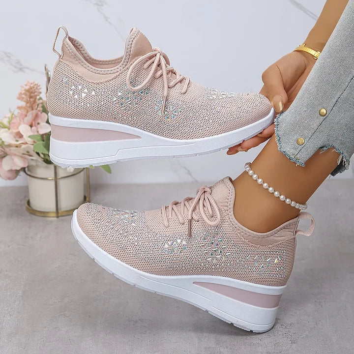 Top-down view of women's embellished trainers showing structured mesh construction and detailing