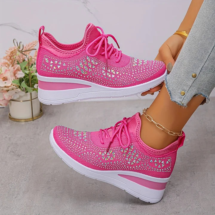 Detailed view of rhinestone and geometric detailing on women's casual trainers