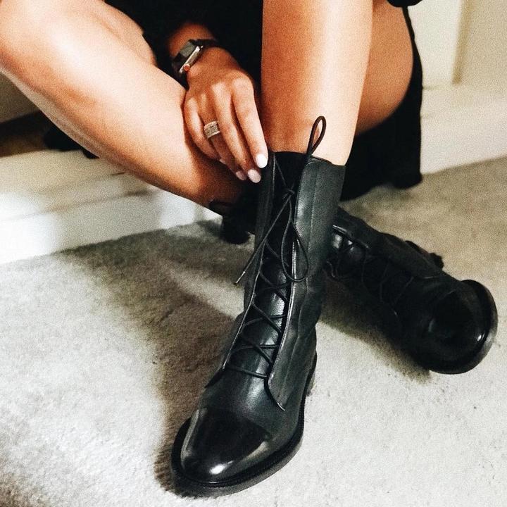 Close-up of chunky rubber sole and textured outer finish on women's ankle boots