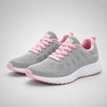Women's mesh trainers in grey with pink laces and cushioned sole for everyday walking
