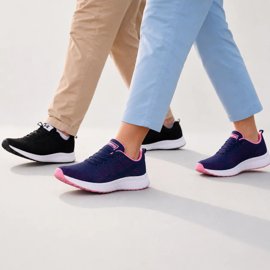 Women's mesh trainers on white background displaying low-profile silhouette and grip sole