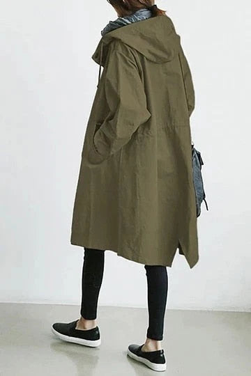 Back view of oversized longline trench coat showing generous silhouette and hood detail