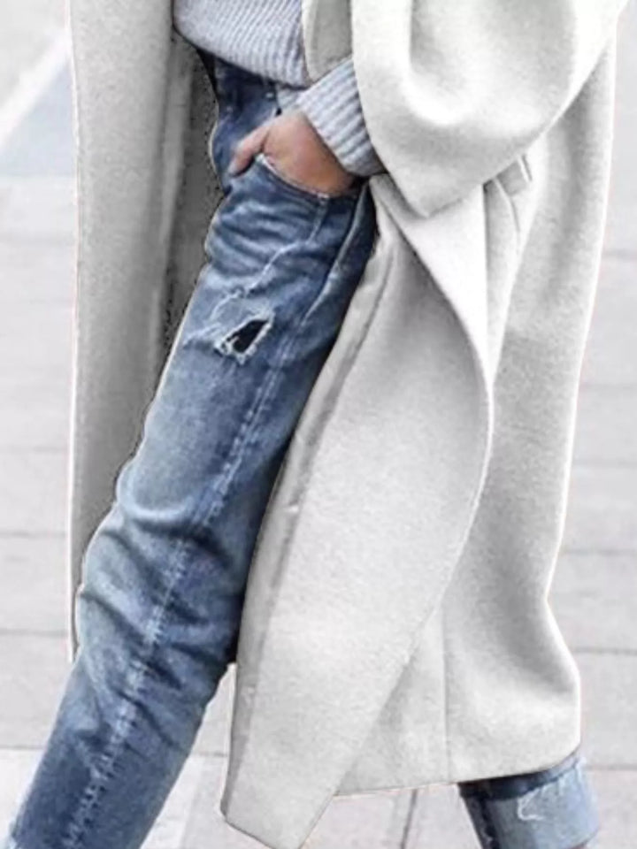 Women's oversized long coat in taupe demonstrating relaxed fit and comfortable silhouette for casual occasions