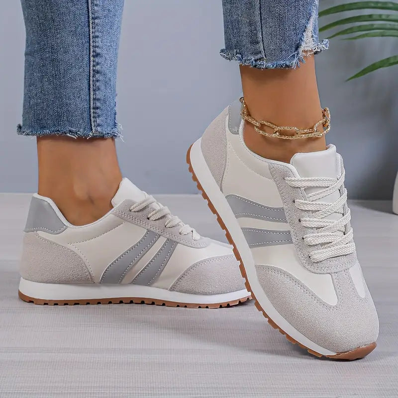 Women's retro running trainers in white and grey with suede overlays and gum rubber sole