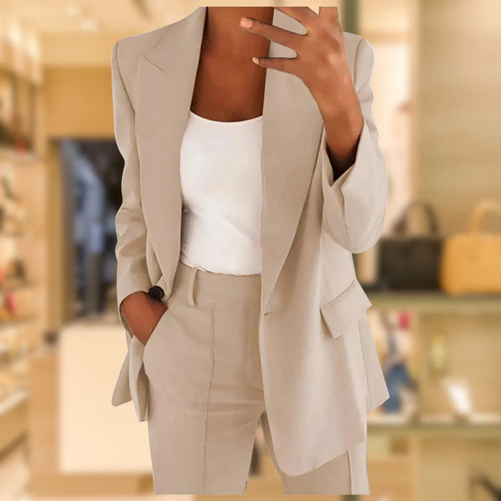 Full-length view of women's formal suit set displaying professional silhouette and tailored construction