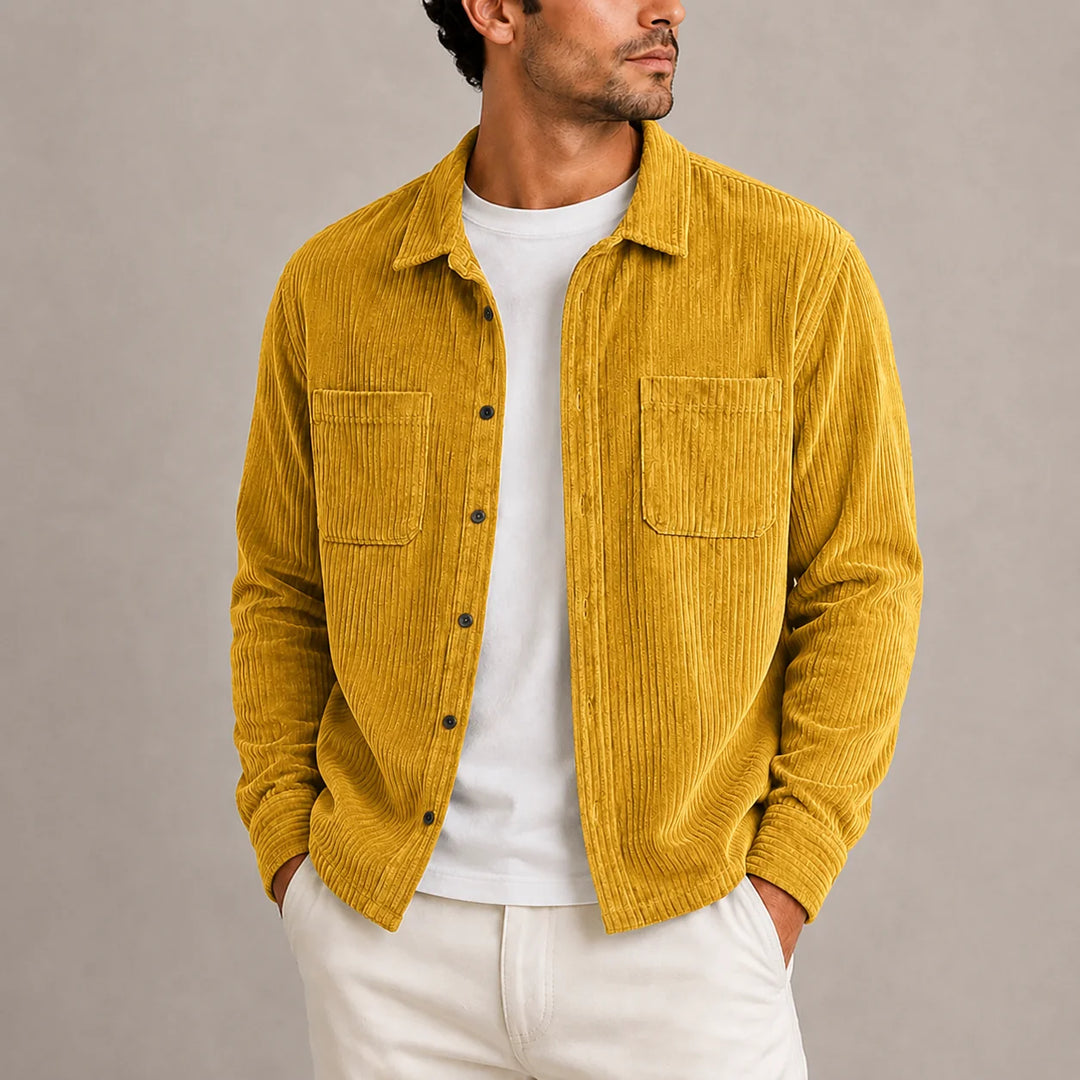 Detail shot of men's corduroy overshirt chest pocket and button-through front closure