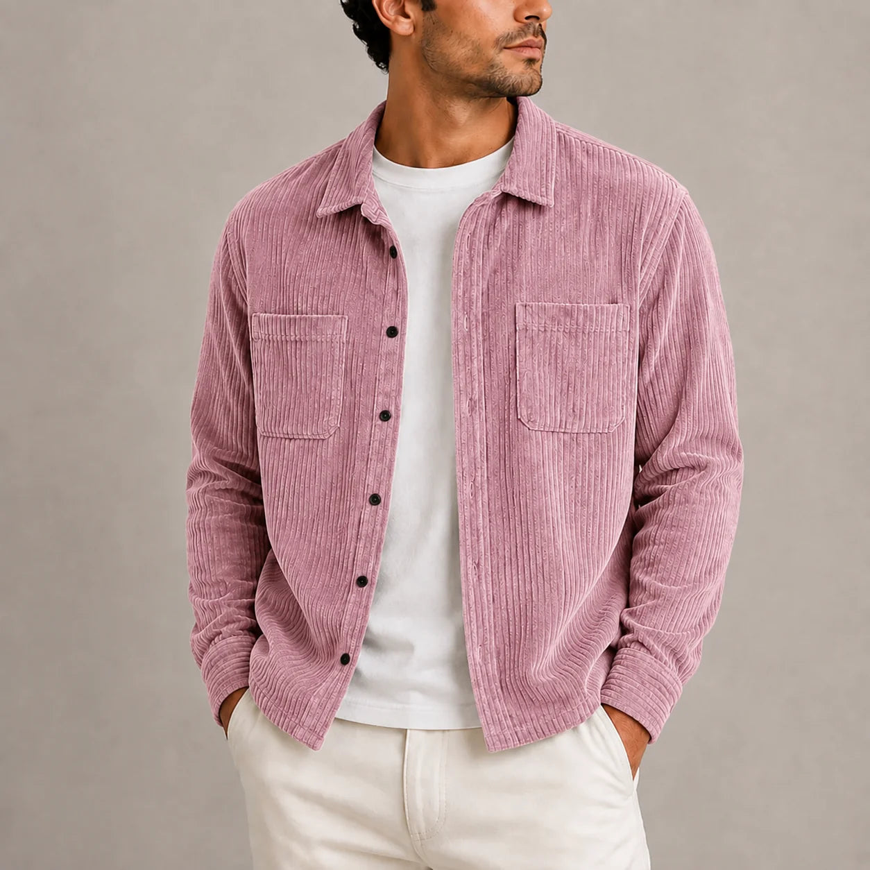 Men's corduroy overshirt styled casually with white trousers for everyday layering look