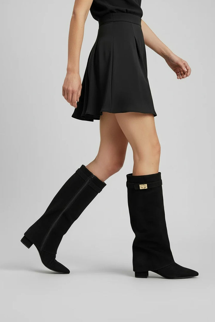 Side view of men's knee high boots showing structured silhouette and side zip fastening