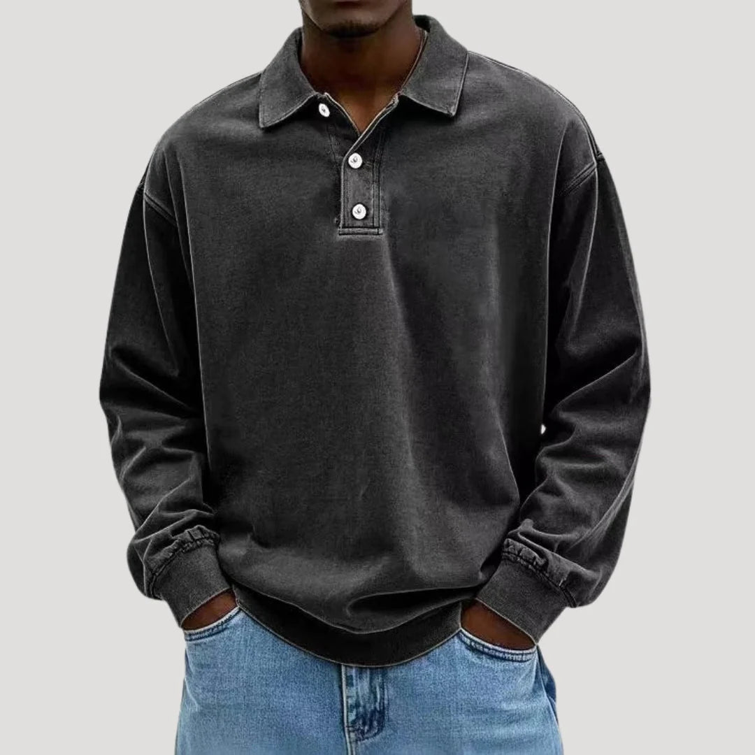 Men's long sleeve polo shirt in charcoal grey with relaxed fit and classic collar detail