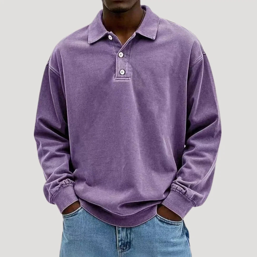 Detail shot of polo collar and contrast stitching on men's long sleeve top