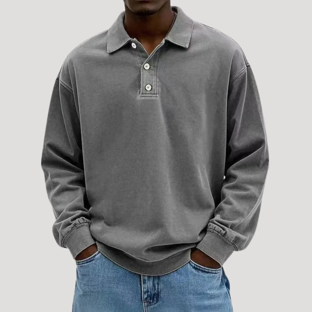 Back view of relaxed fit long sleeve polo shirt with even hem finish
