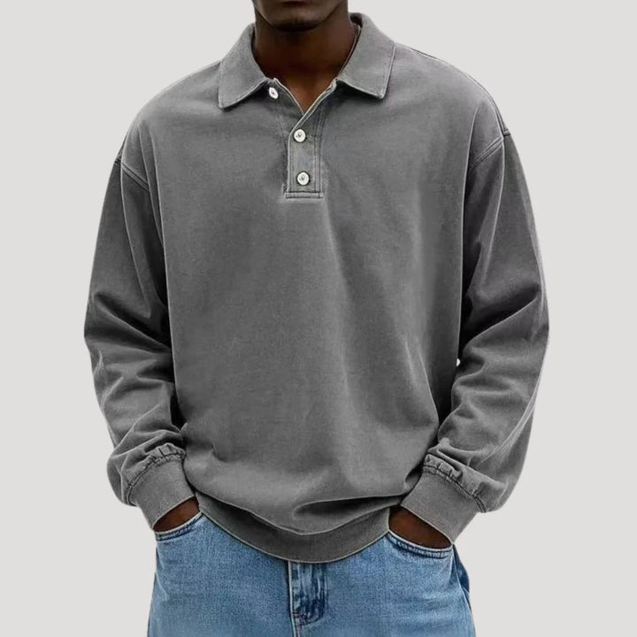 Back view of relaxed fit long sleeve polo shirt with even hem finish