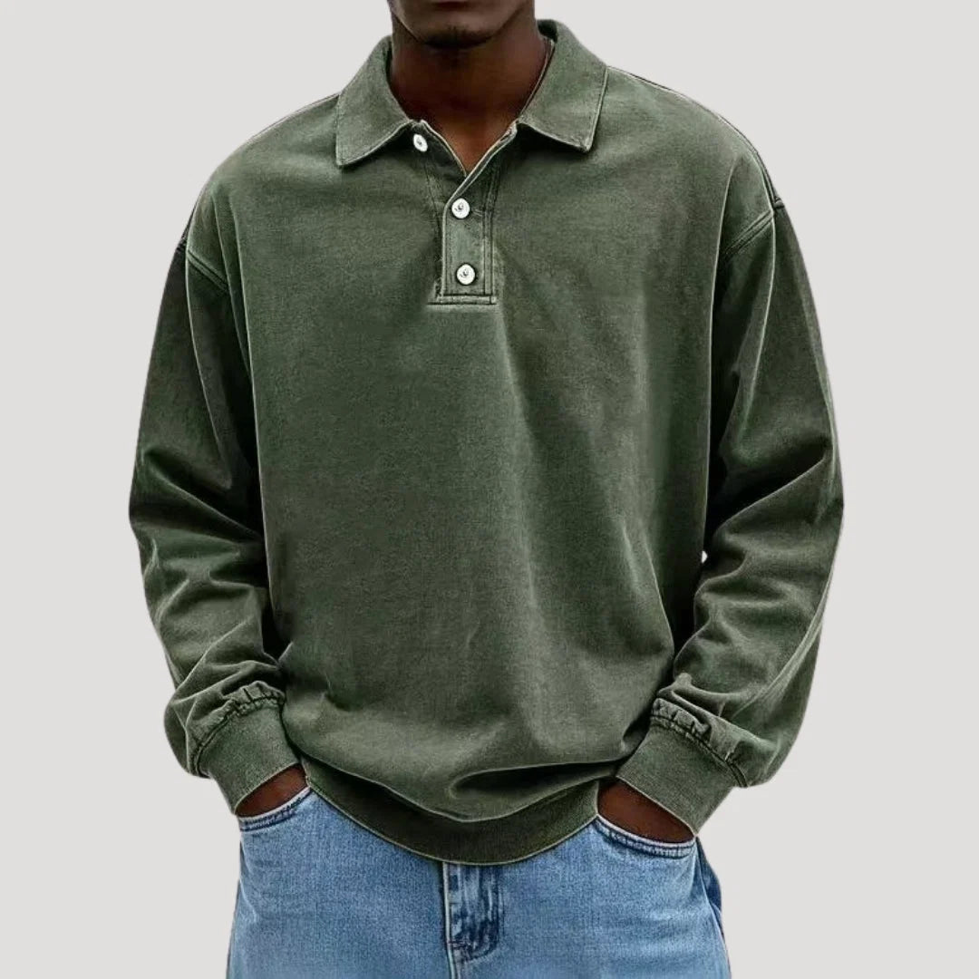 Men's polo shirt layered over casual outfit demonstrating versatile styling options