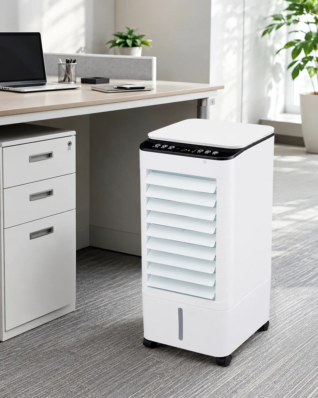 Close view of portable evaporative air cooler showing horizontal vent design and compact tower shape