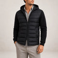 Men's hooded puffer jacket with quilted body and knit sleeves in black, front zip closure