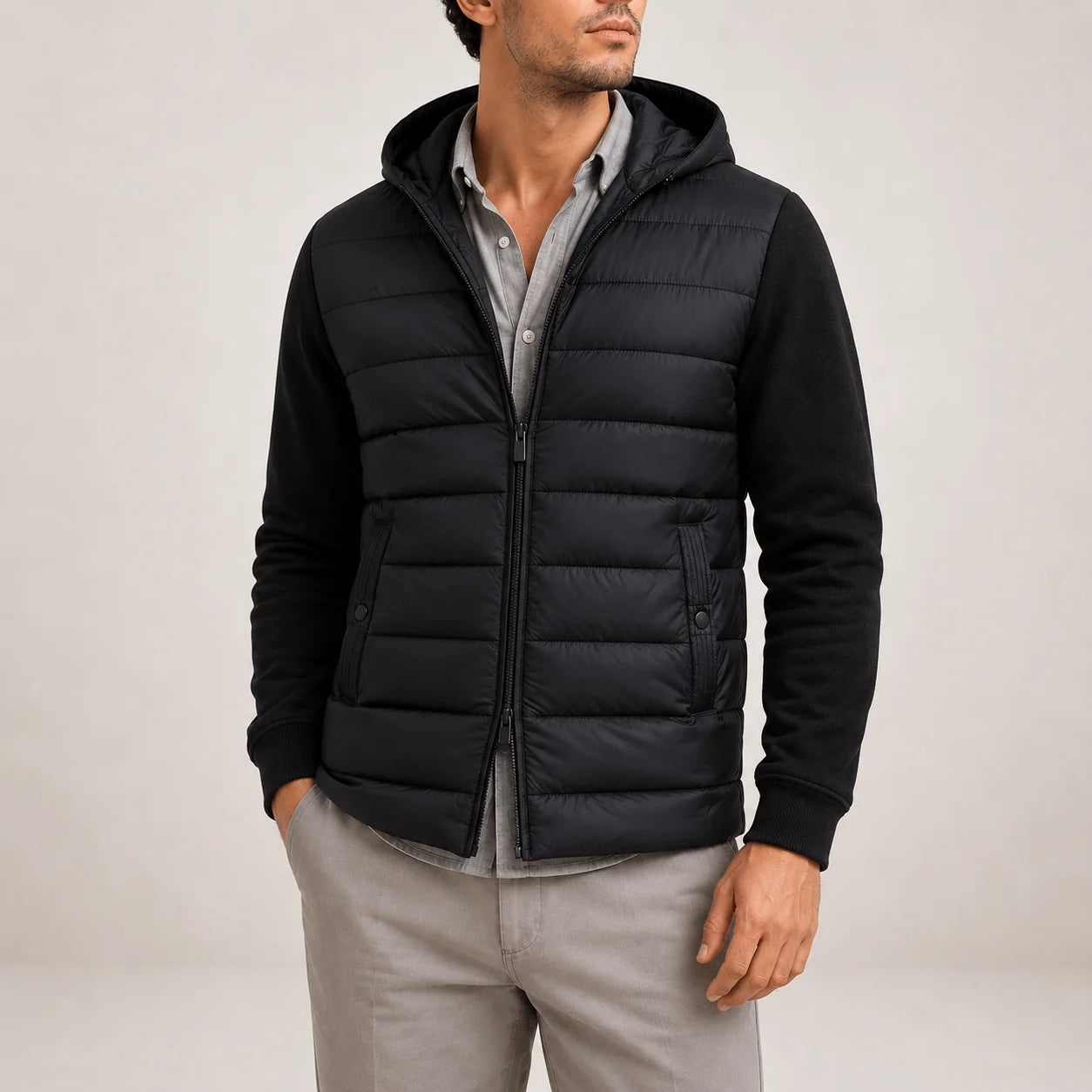 Men's hooded puffer jacket with quilted body and knit sleeves in black, front zip closure
